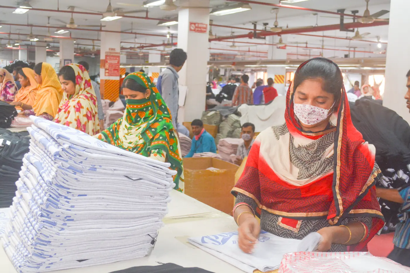 Cutting facility with fabric layers